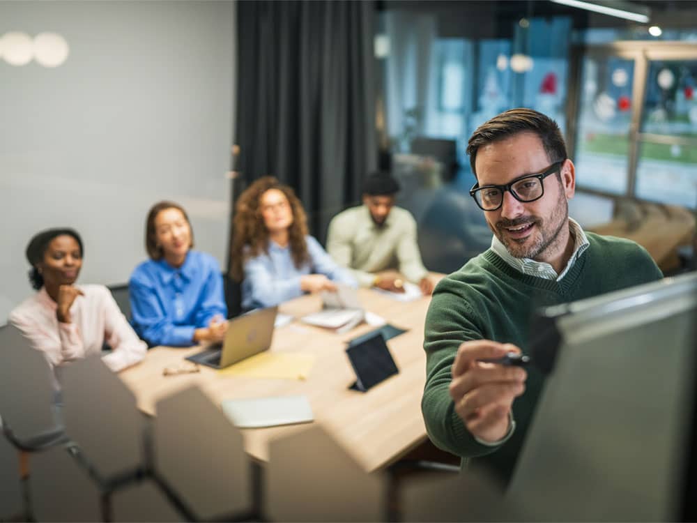Workplace professionals focused on their actual job, contrasted with cleaning responsibilities.